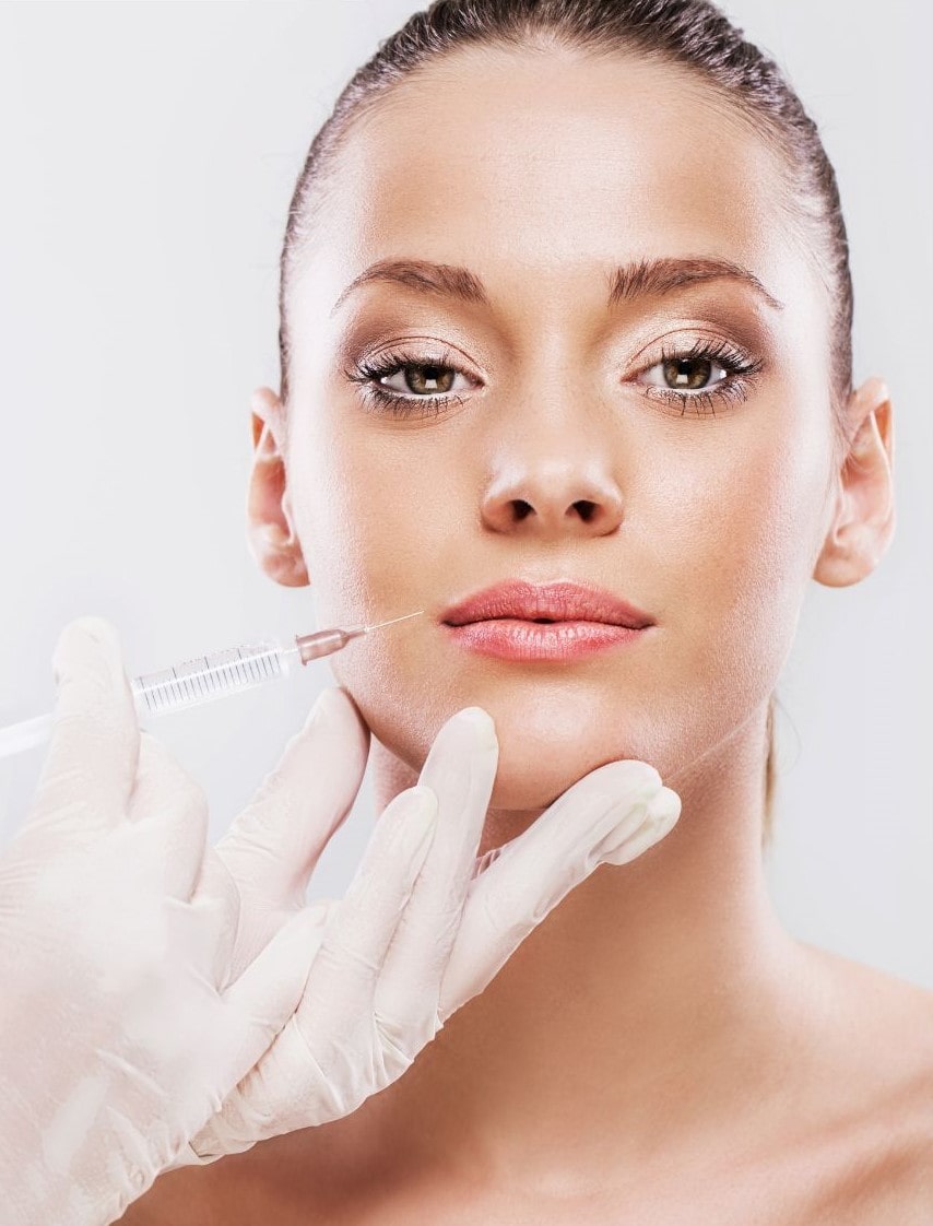 Woman receiving filler treatment for facial contouring and hydration